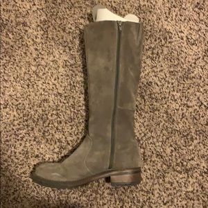 Gray riding boots
